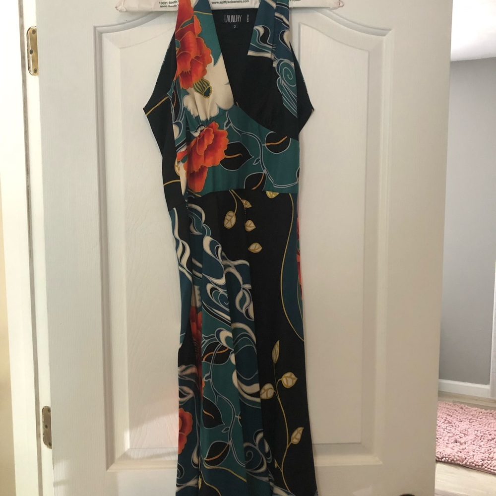 Laundry size 2 silk dress. Worn once, dry cleaned and stored.